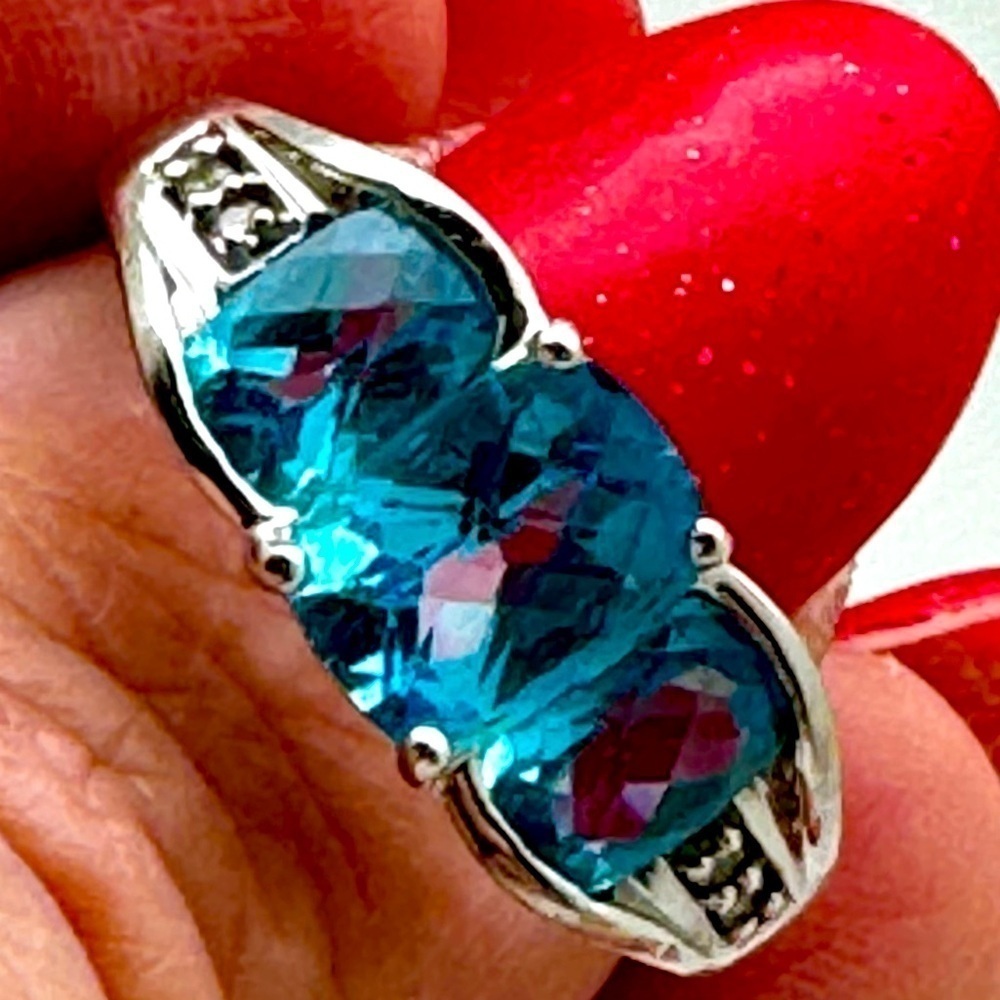 Price‎ reduced! Blue Topaz Stunner! Size 7 and set in 10k gold
